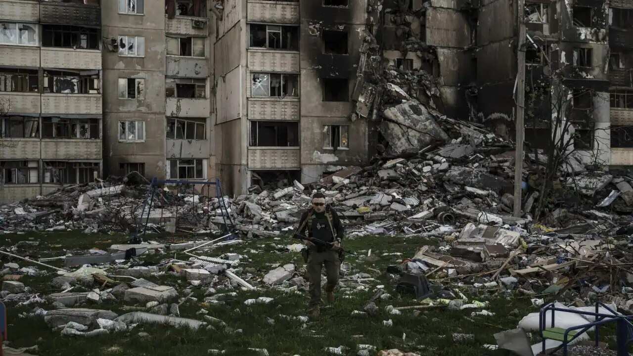A Ukrainian serviceman walks amid the rubble of a building heavily damaged by multiple Russian bombardments near a frontline in Kharkiv, Ukraine, on Monday, 25 April, 2022.