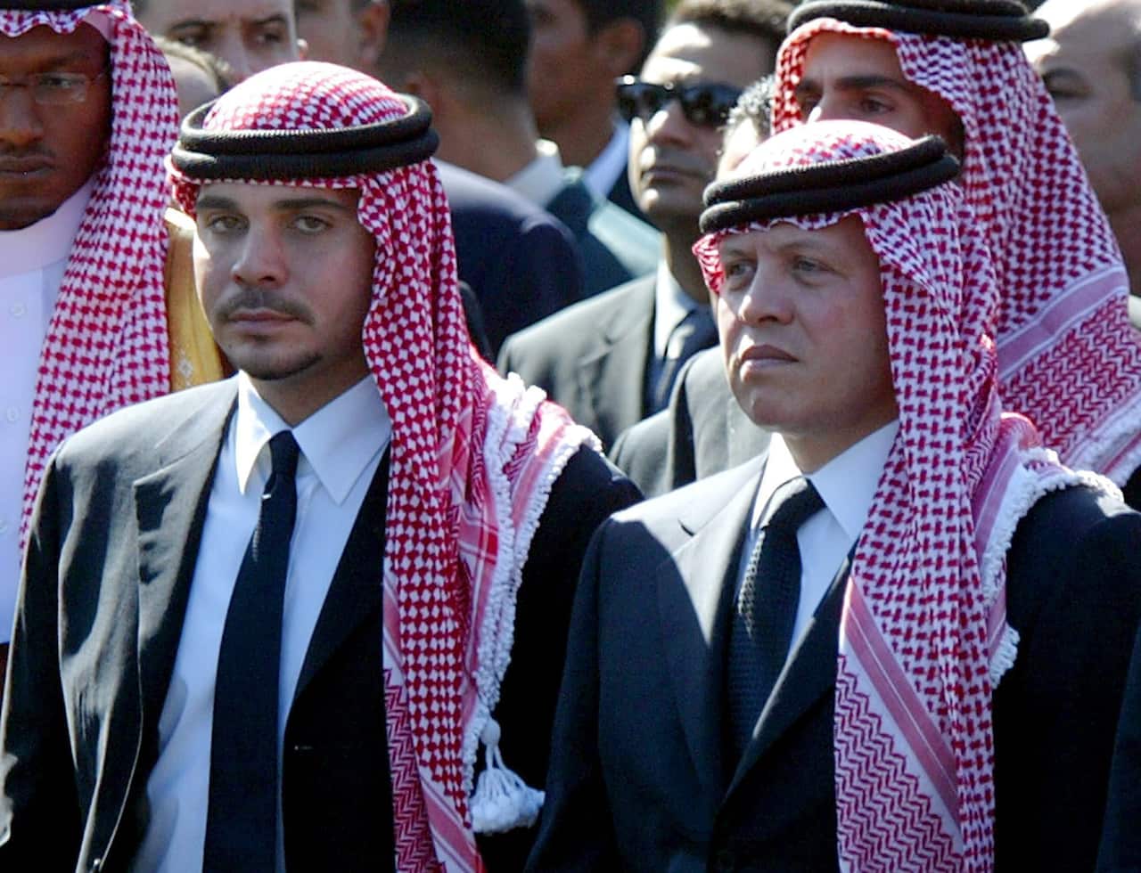 Former Jordanian Crown Prince Hamzah bin Al Hussein  with his half brother King Abullah of Jordan at a funeral in Cairo, Egypt in 2004.