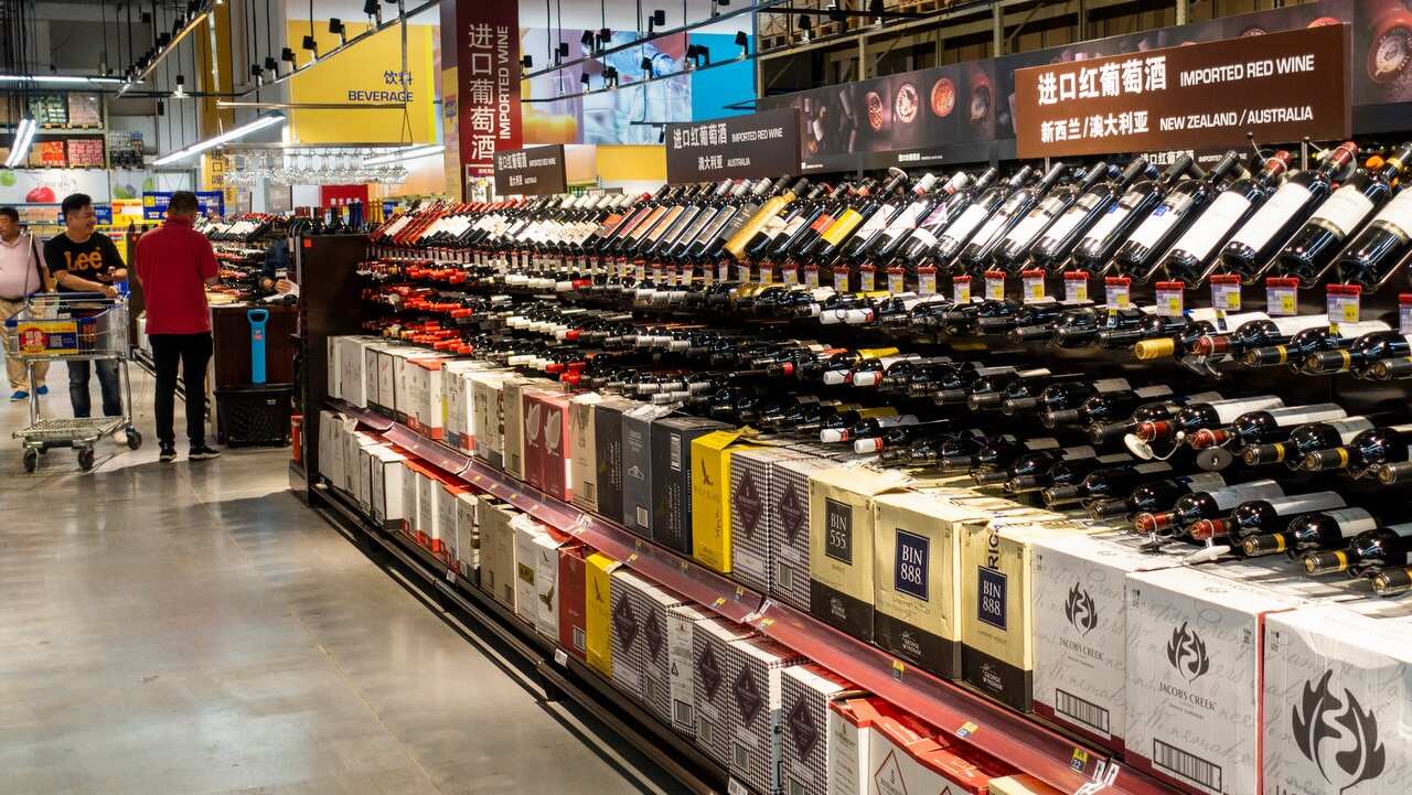 Bottles of red wine imported from Australia and New Zealand are for sale at a Metro Supermarket in Shanghai.