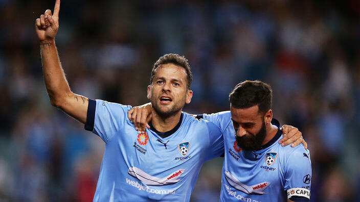 Sydney FC's goalscorers Bobo, left, and Alex Brosque celebrate their win over Melbourne City 