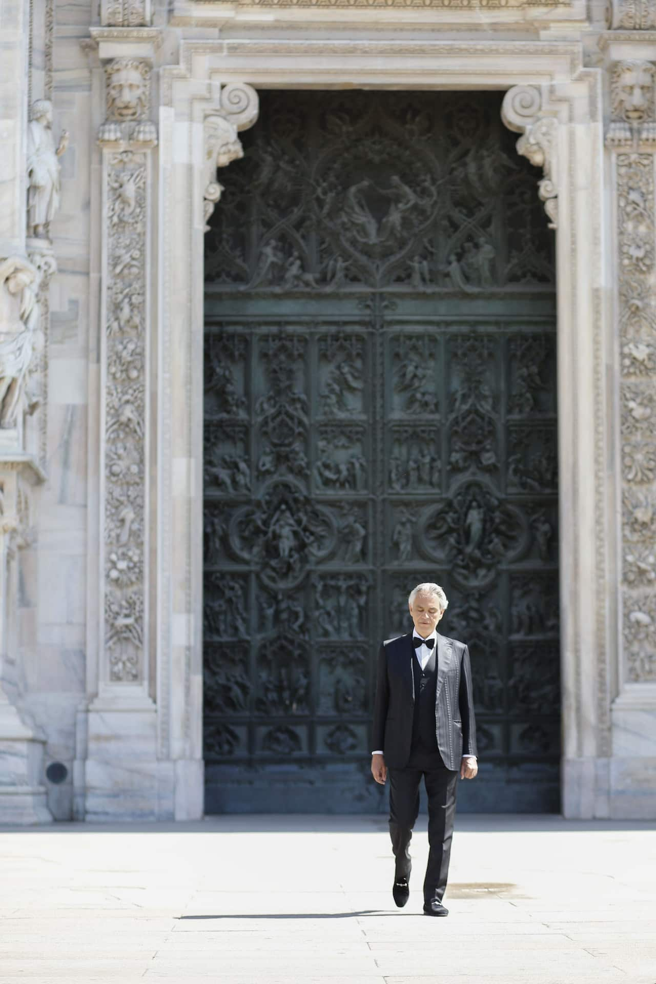 Tenor Andrea Bocelli in front of the Duomo, Milan