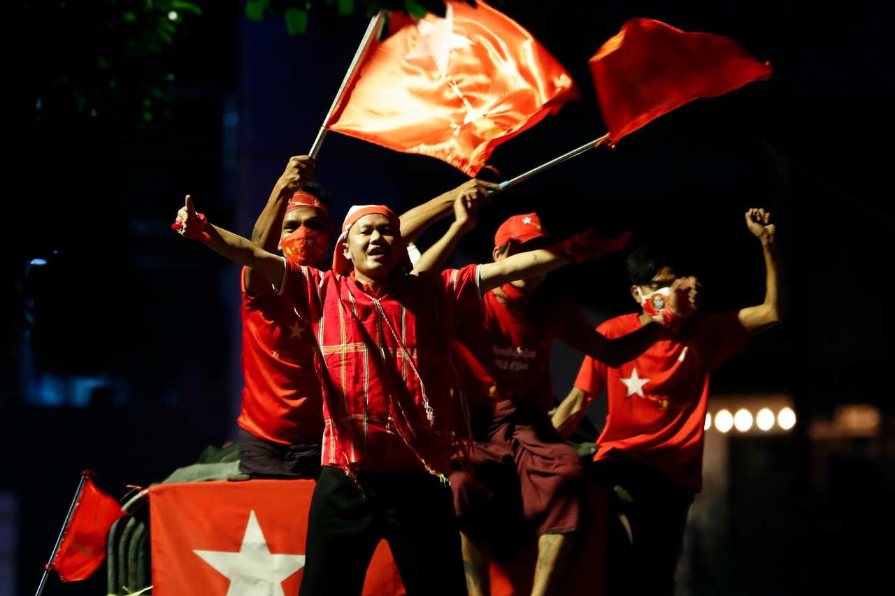 Supporters of National League for Democracy party, led by Myanmar State Counsellor Aung San Suu Kyi, celebrate their election victory.