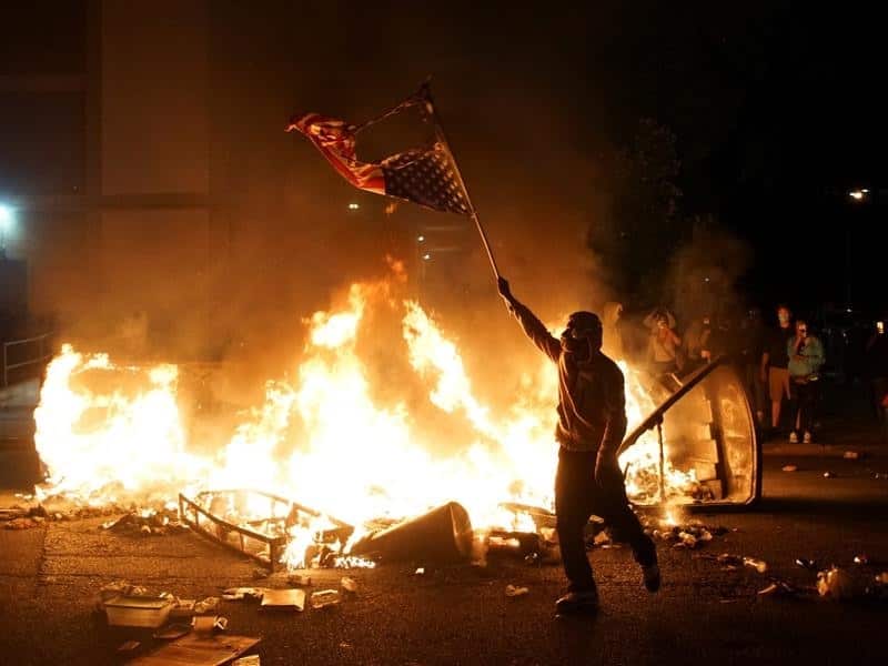The movement has accused the billionaire philanthropist George Soros of being behind the violence.