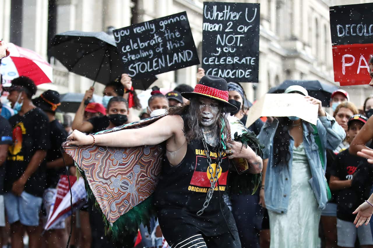 Activists dance during an Invasion Day rally in Meanjin (Brisbane) on January 26 2022.