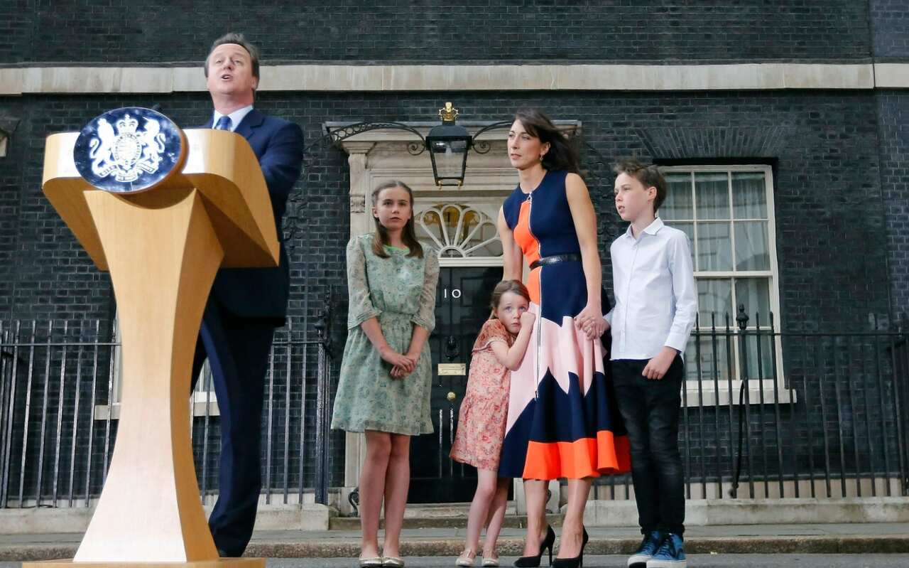 July 13, 2016 file photo Britain's Prime Minister David Cameron, speaks to the media as his wife Samantha and their children as he resigns after the Brexit vote