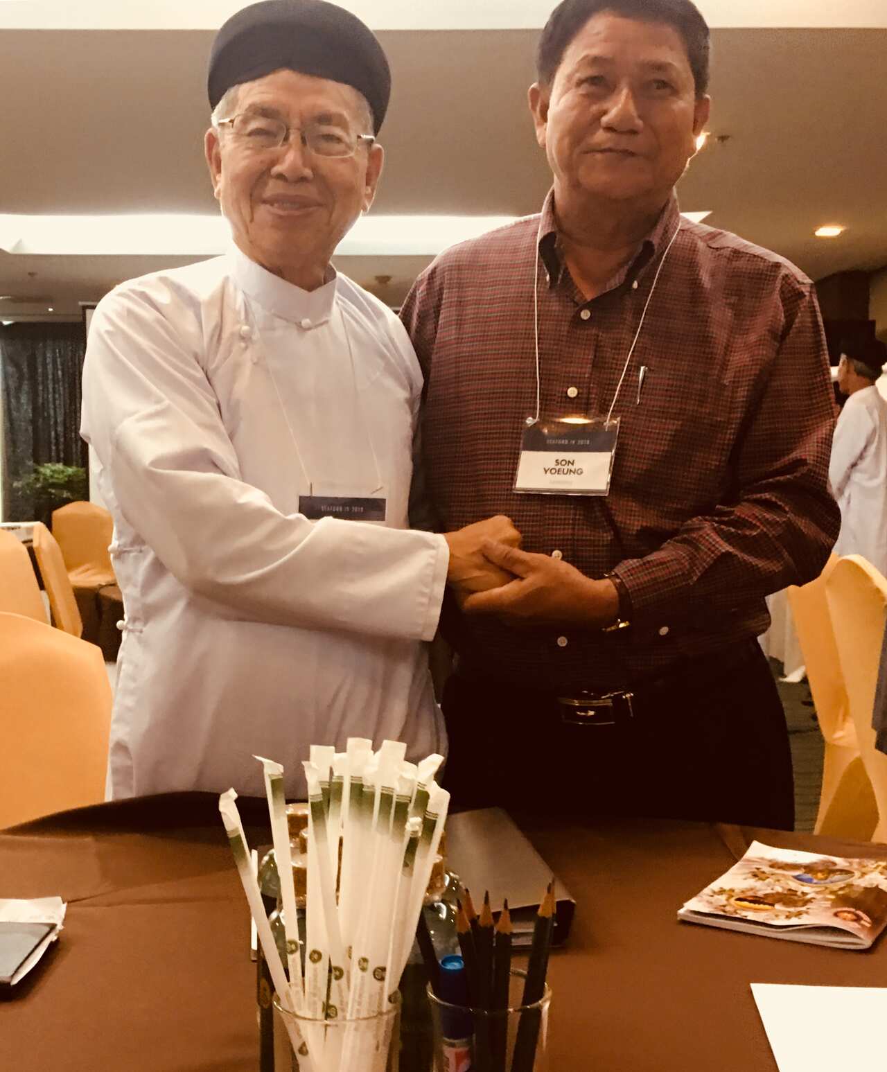 Mr Do Minh Duc with an official attending the 8th Vietnam Day