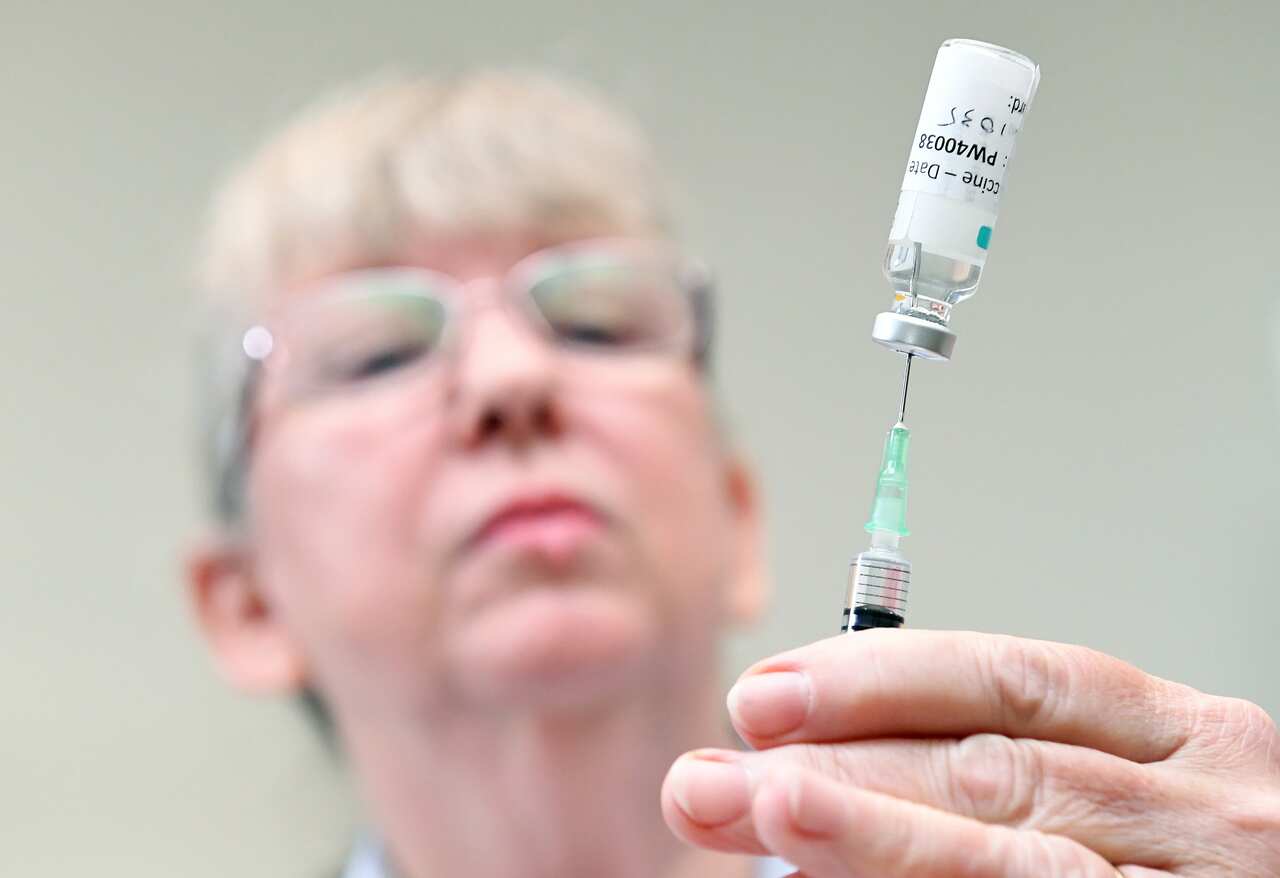 A nurse draws from a vial of Covid-19 vaccine at the Camp Hill Medical Centre n Brisbane on Monday, March 22, 2021.