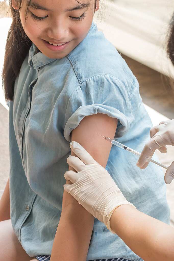 Young teenage girl getting the HPV vaccine.