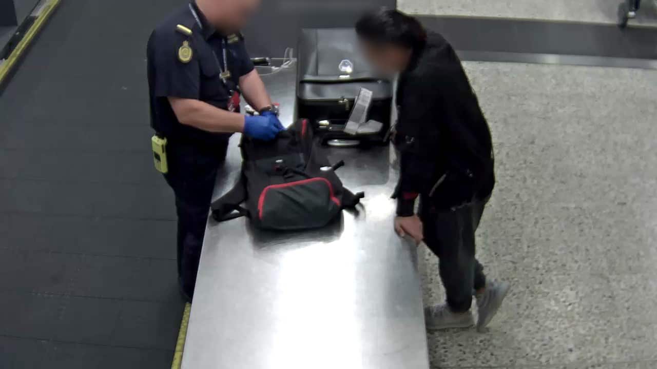 A 22 year old Chinese national has had his Student visa cancelled and has been detained after he was found to be in possession of child exploitation material at Melbourne airport.