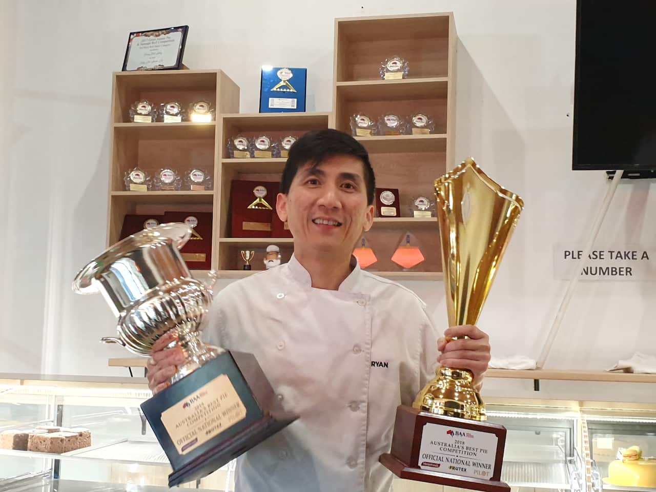 Ryan Khun from Country Cob Bakery is holding the best pie awards