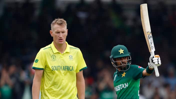 Pakistan's Babar Azam, right, celebrates after getting 50 runs not out during their Cricket World Cup match between Pakistan and South Africa at Lord's cricket ground in London, Sunday, June 23, 2019. (AP Photo/Alastair Grant)