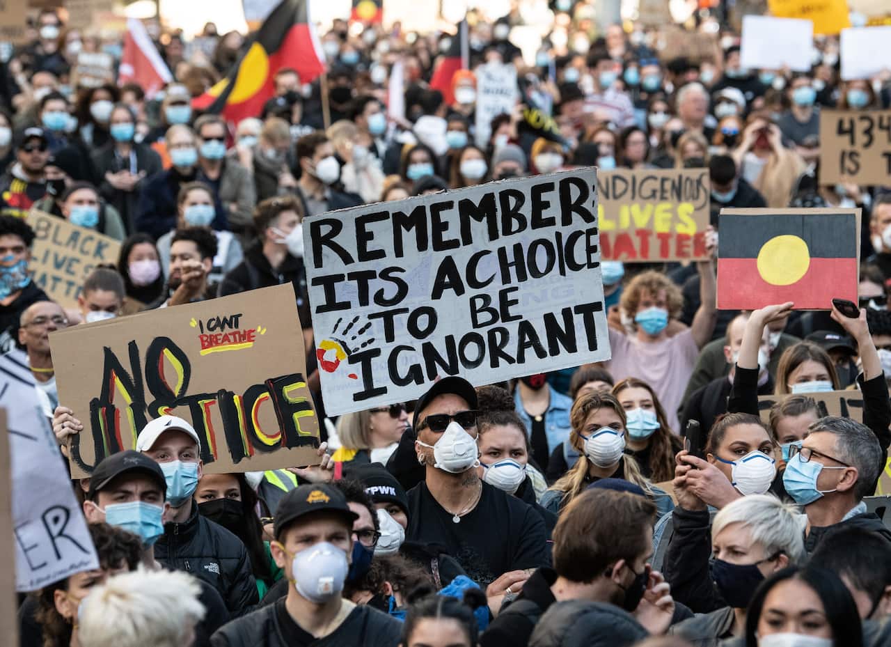 Protesters participate in a Black Lives Matter rally in Sydney last weekend.