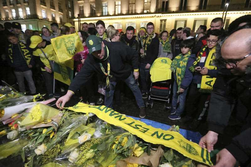 Supporters gather to pay tribute to Argentinian soccer player Emiliano Sala, in Nantes, western France, Tuesday, Jan. 22, 2019.