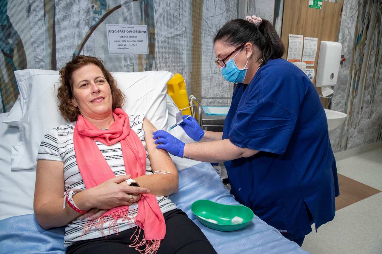 A volunteer is seen during a coronavirus vaccine development announcement in Brisbane, Monday, July 13, 2020.