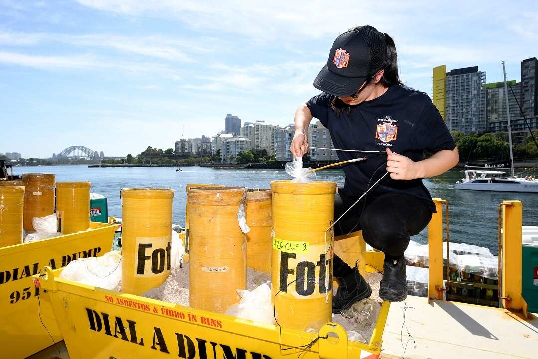 A technician packs fireworks in preparation for the New Year's Eve celebrations at Glebe Island in Sydney.
