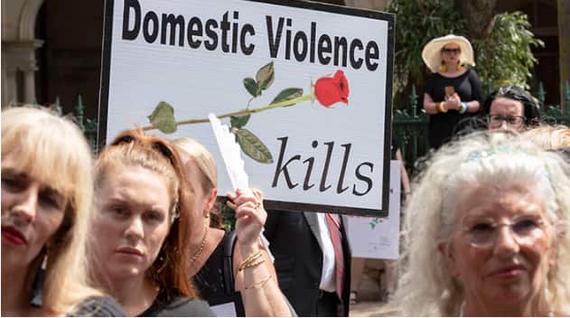 Women rally against family violence in Queensland. AAP
