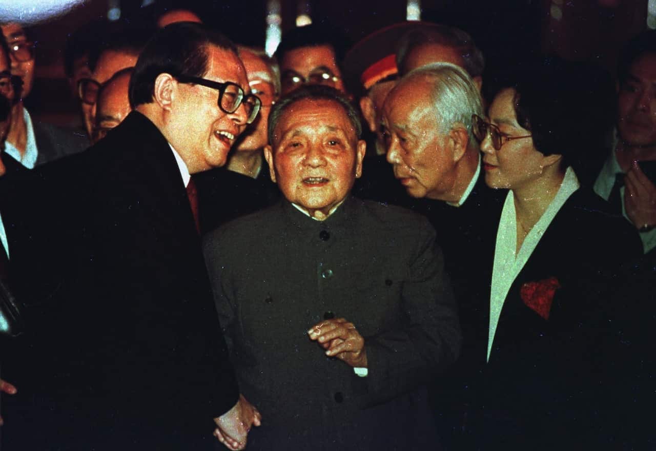 China's top leader Deng Xiaoping, then 88, center, chats with Communist Party General Secretary Jiang Zemin, left, while Chairman of the Legislature Wan Li