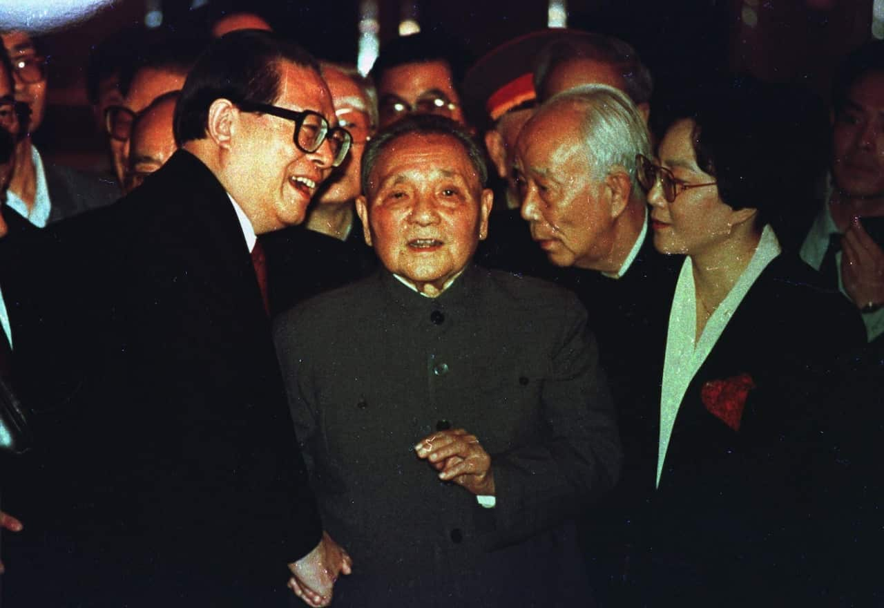 China's top leader Deng Xiaoping, then 88, center, chats with Communist Party General Secretary Jiang Zemin, left, while Chairman of the Legislature Wan Li 