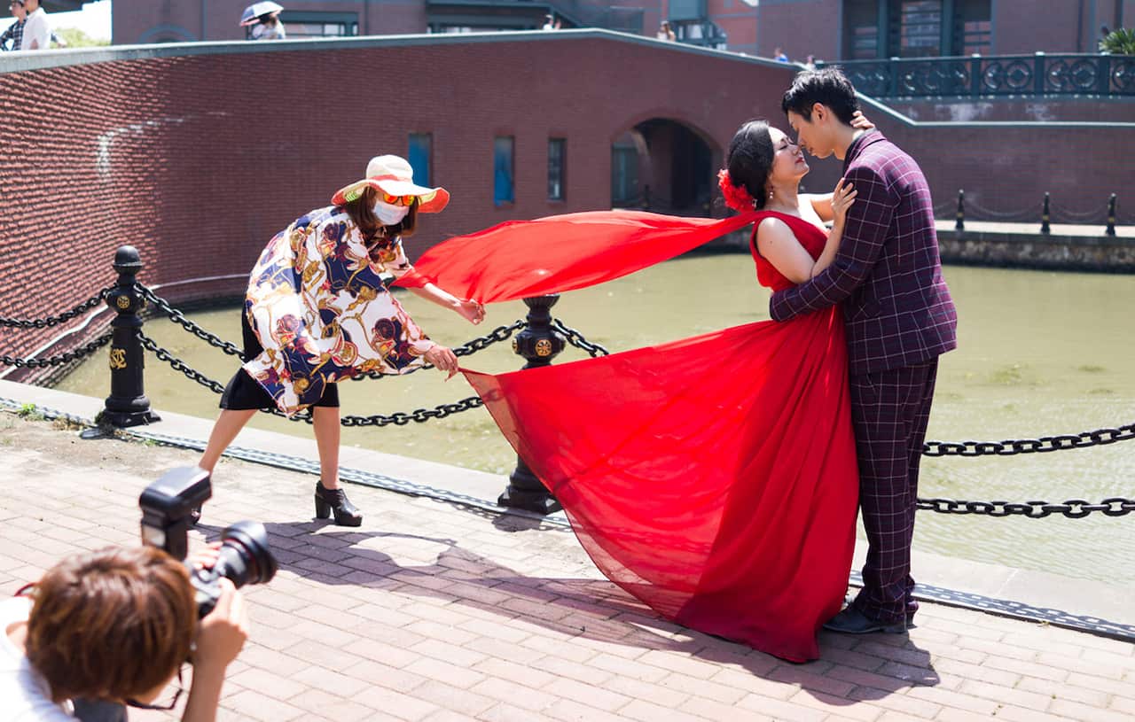 In Thamestown, a whole town out of Shanghai that is modelled on the UK. The town is residential but it is mainly used for photoshoots for pre weddings. In particular the English church - which can be filled with couples on a weekend.