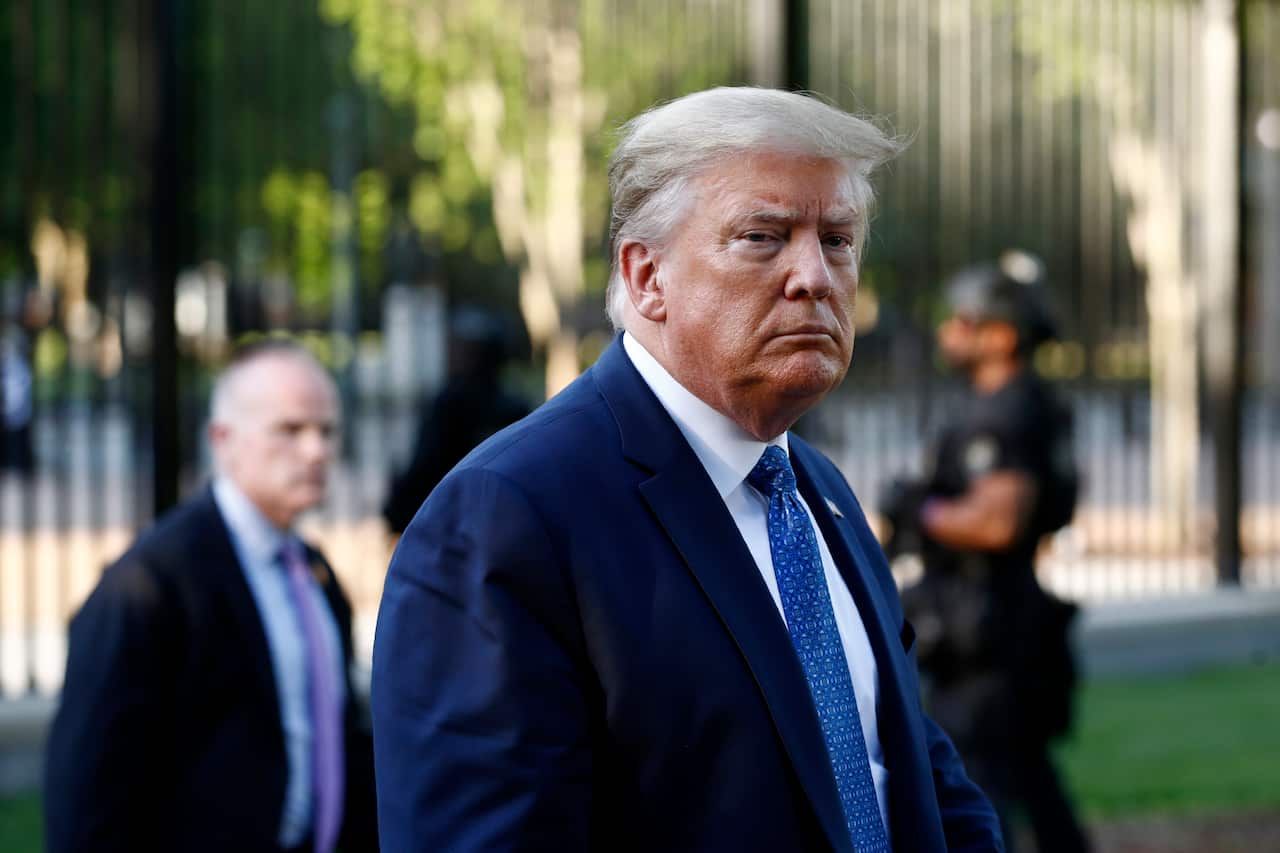 Donald Trump returns to the White House after visiting outside St. John's Church, Monday, June 1, 2020