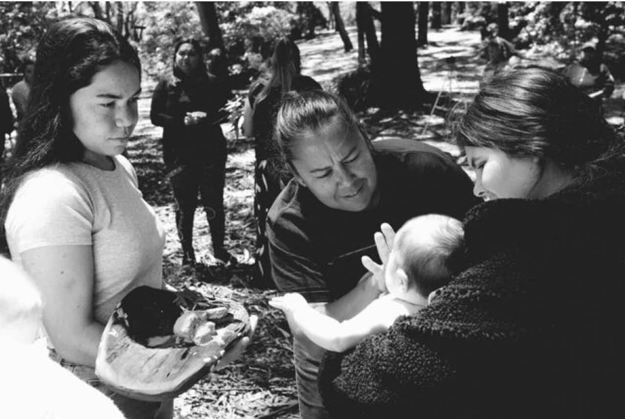 Senior midwife at Waminda, Melinda Briggs helps a mother as part of the Birthing on Country program
