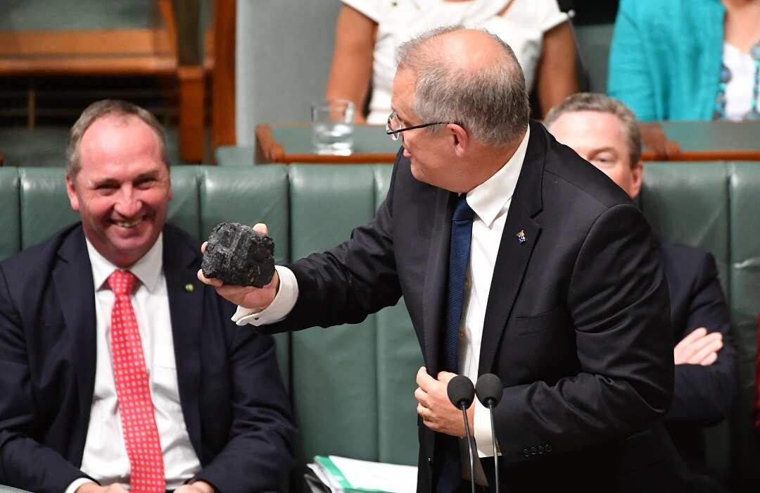 PM Scott Morrison with a lump of coal during Question Time in the House of Representatives at Parliament House in Canberra, Thursday, Feb. 9, 2017. (AAP Image/Mick Tsikas) NO ARCHIVING