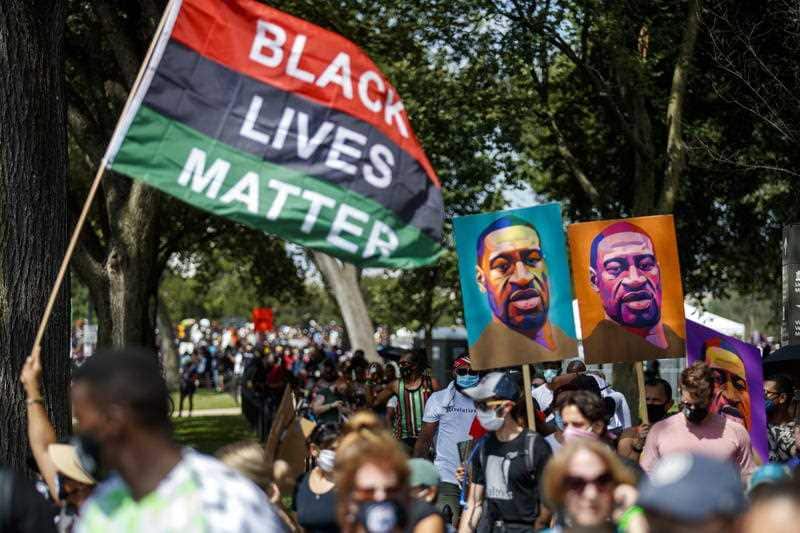 Protestors hold signs during the March on Washington.