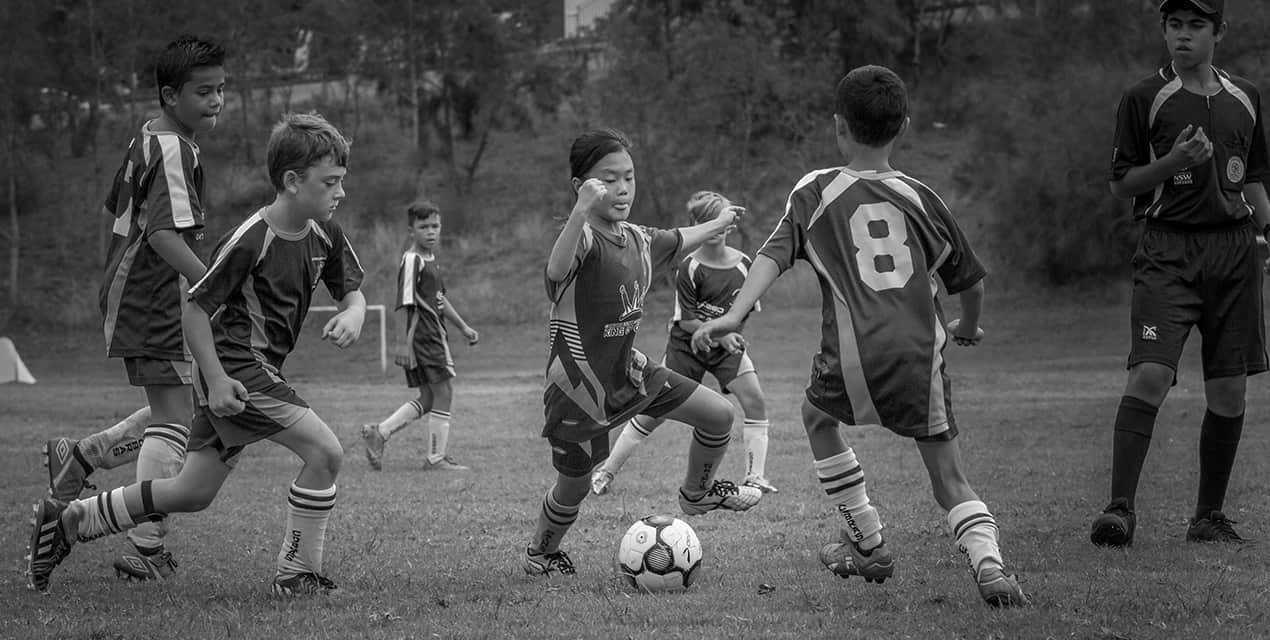 Elika taking on the boys as a junior. 