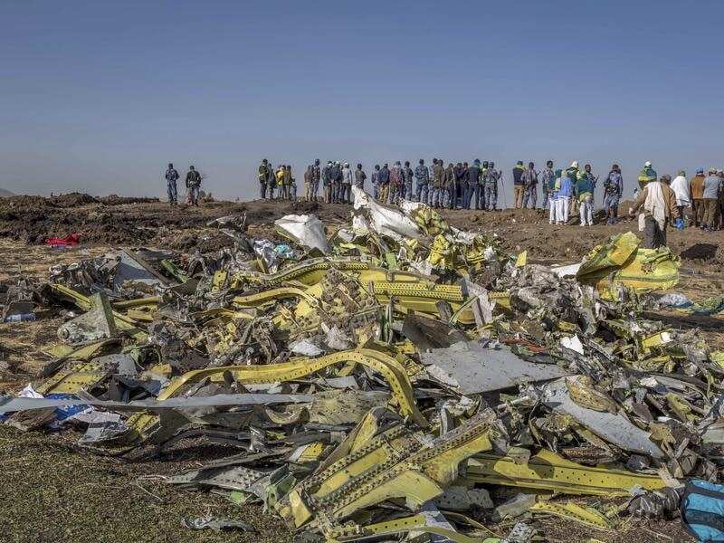Wreckage is piled at the crash scene