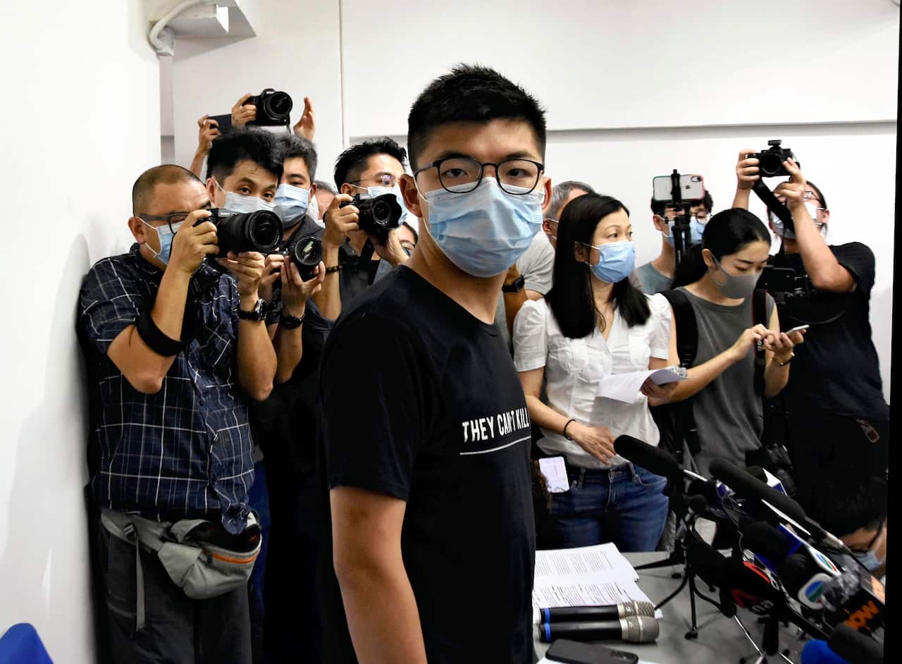 Democracy activist Joshua Wong holds a press conference in Hong Kong on 31 July