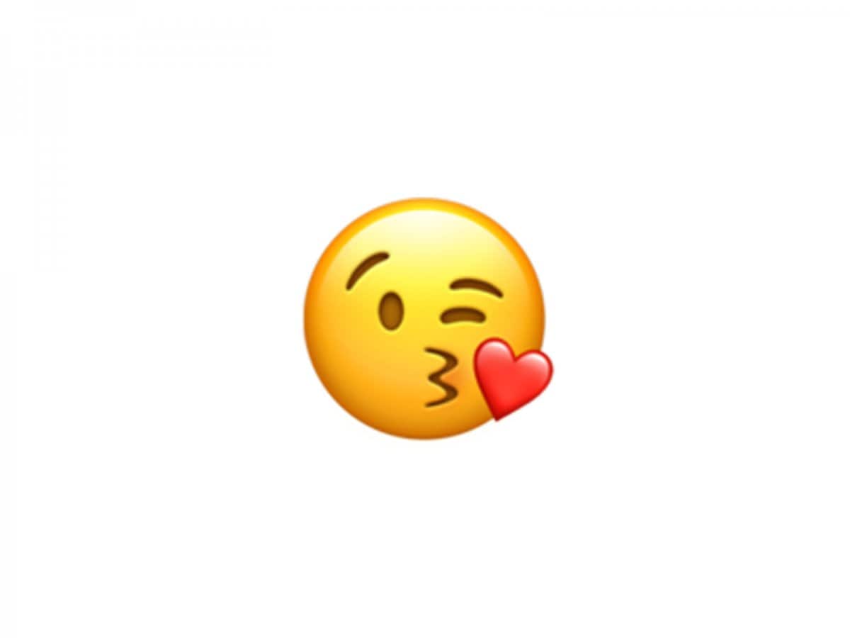 Face blowing a kiss