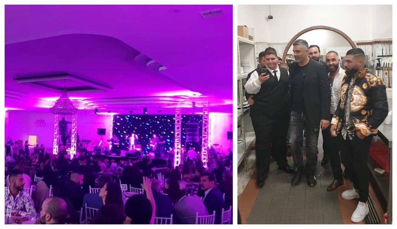 Fares Karam after his concert taking pictures with the kitchen staff