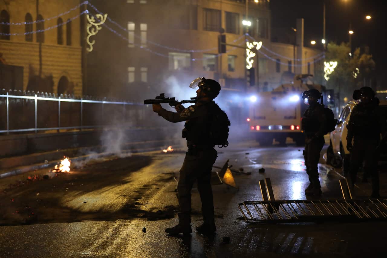 Israeli police fires grenades during a protest in Damascus Gate in Jerusalem, 8 May 2021.
