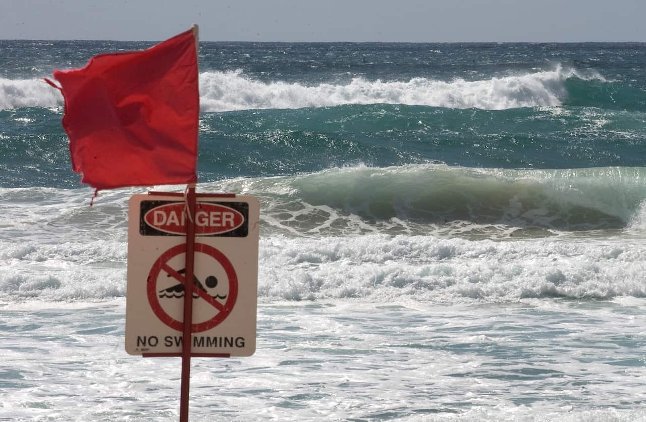 A danger sign on the beach at Kurrawa on the Gold Coast