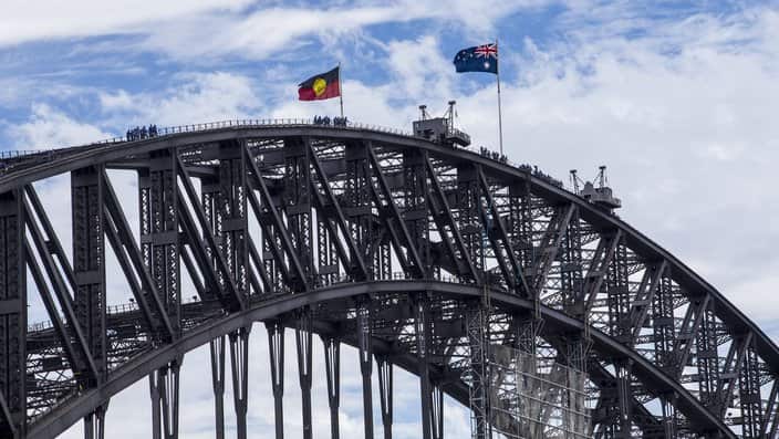 The Australian and the Aboriginal flag together on the Sydney Harbour bridge for the first time ever, Australia Day, Sydney, January 26, 2013.