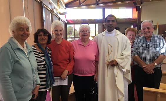 priest returns to church