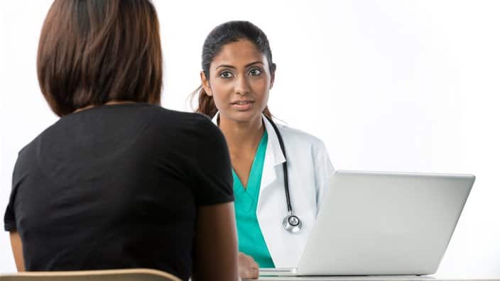 Doctor consulting with a patient.
