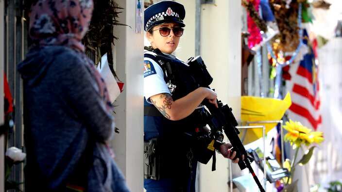 An armed police officer stands guard outside the Al Noor mosque during Friday prayers in Christchurch on May 3, 2019, ahead of the holy month of Ramadan.