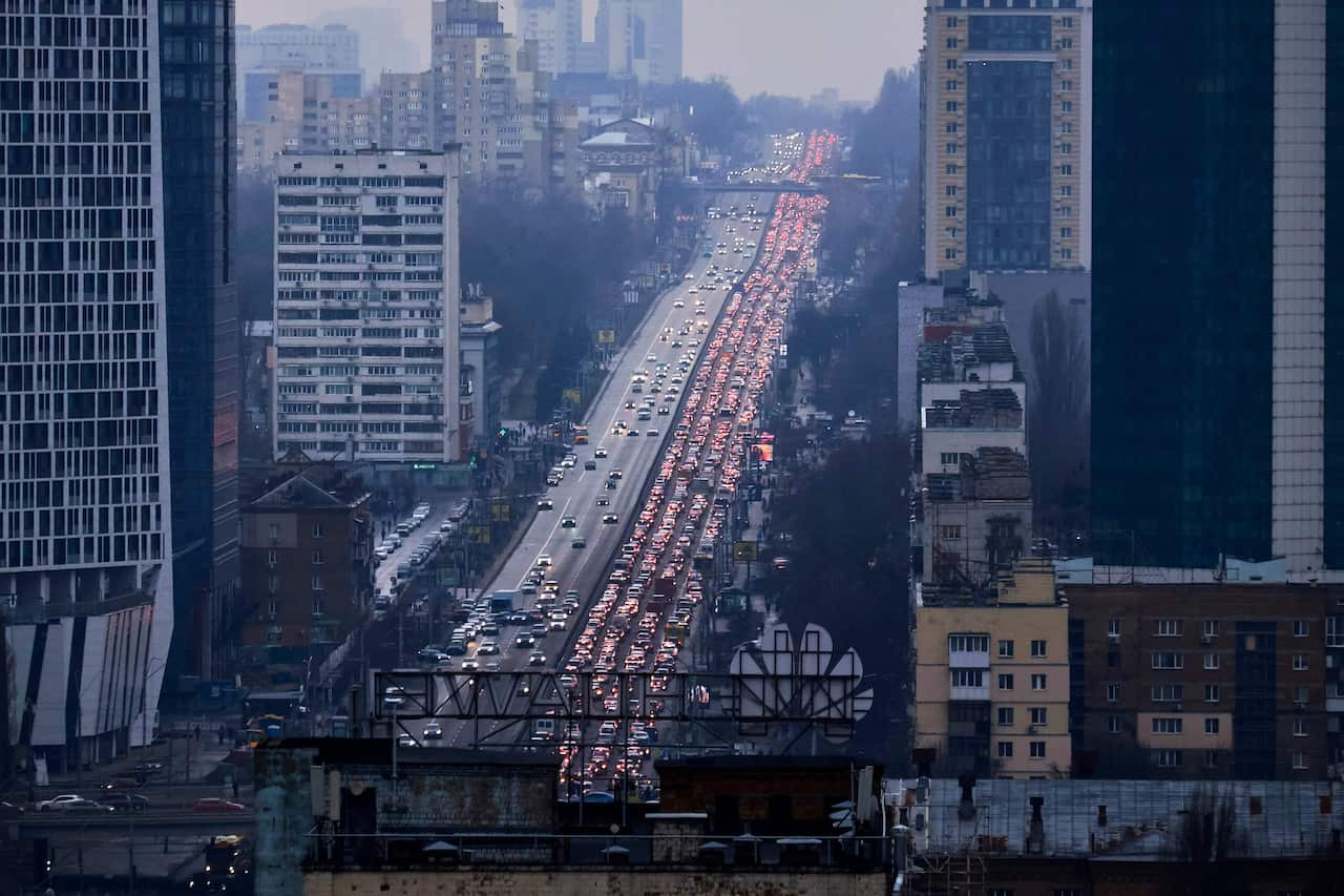 Residents of Kyiv leave the city following pre-offensive missile strikes of the Russian armed forces on 24 February, 2022. 