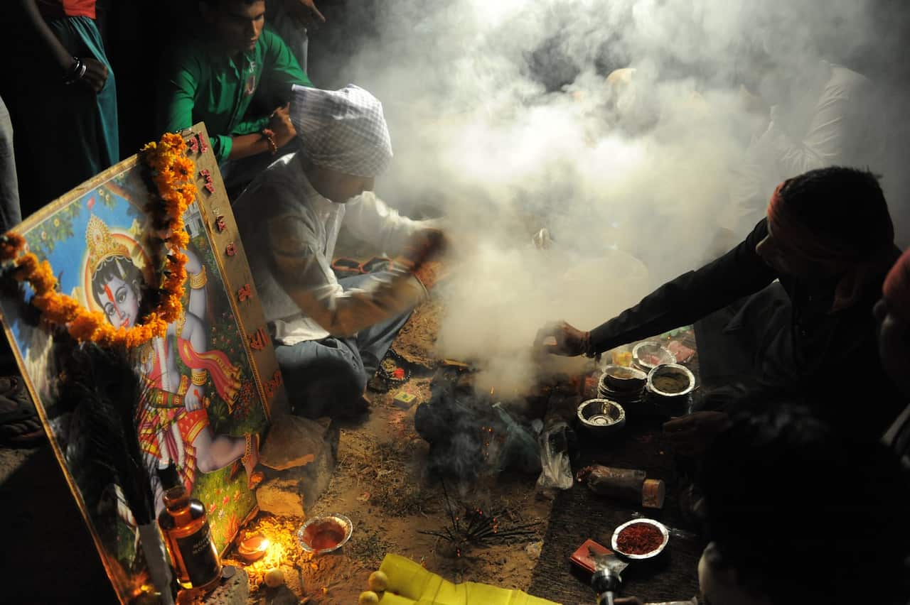 Tantrik or Voodoo performers participate