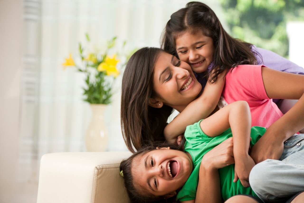 Indian mother and child happy