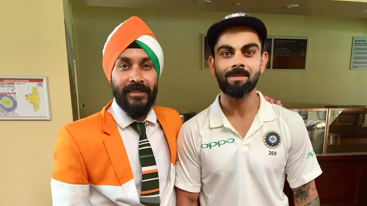 Gurnam Singh (L) with Indian skipper Virat Kohli