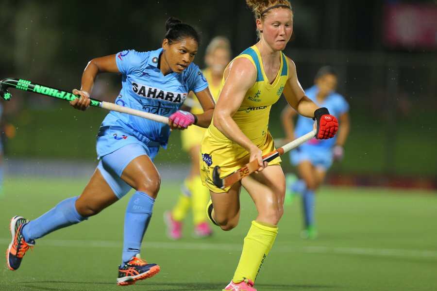 Indian and Australian women Hockey team in action 