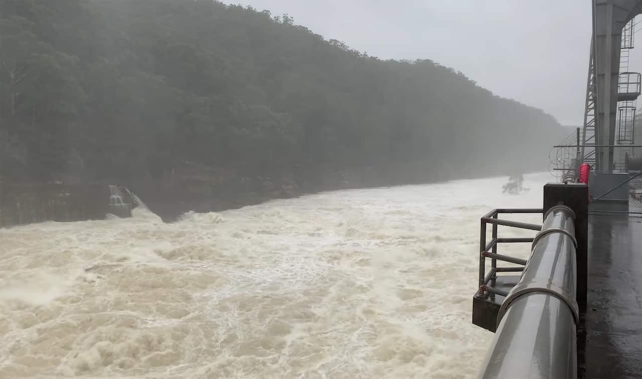 A screen grab from a supplied video showing water spilling from the Warragamba Dam in Greater Sydney, Sunday, March 201, 2021.