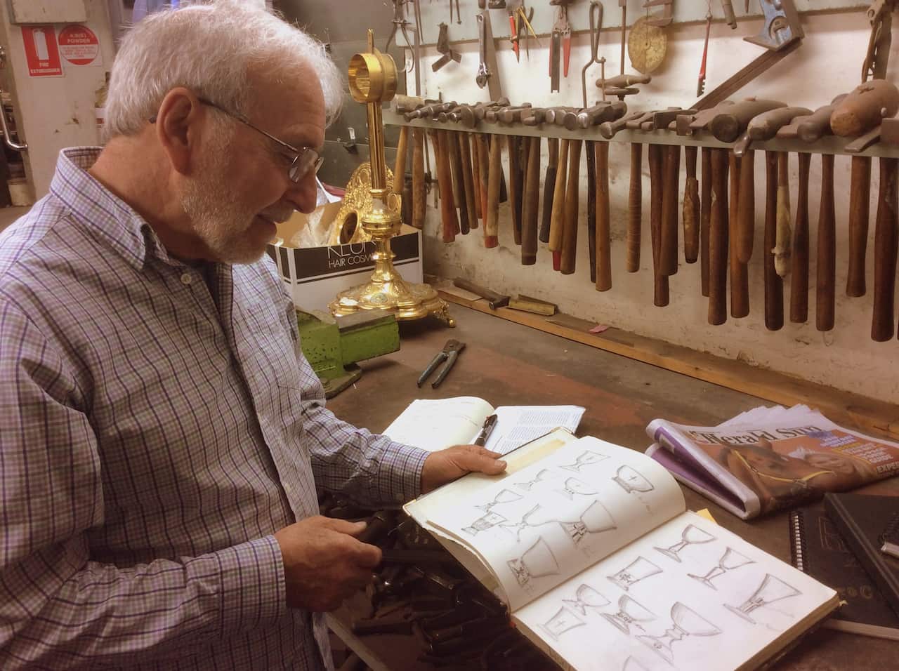 Fortunato 'Lucky" Rocca showing some sketches