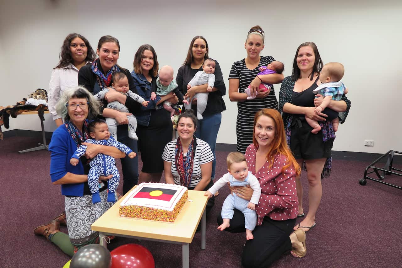 Baggarook Yerongi celebrations. Front right-Sophie Habel with baby Oscar