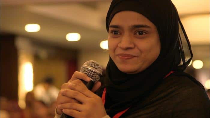 Huda introduces herself to other at the matchmaking event in Mumbai.