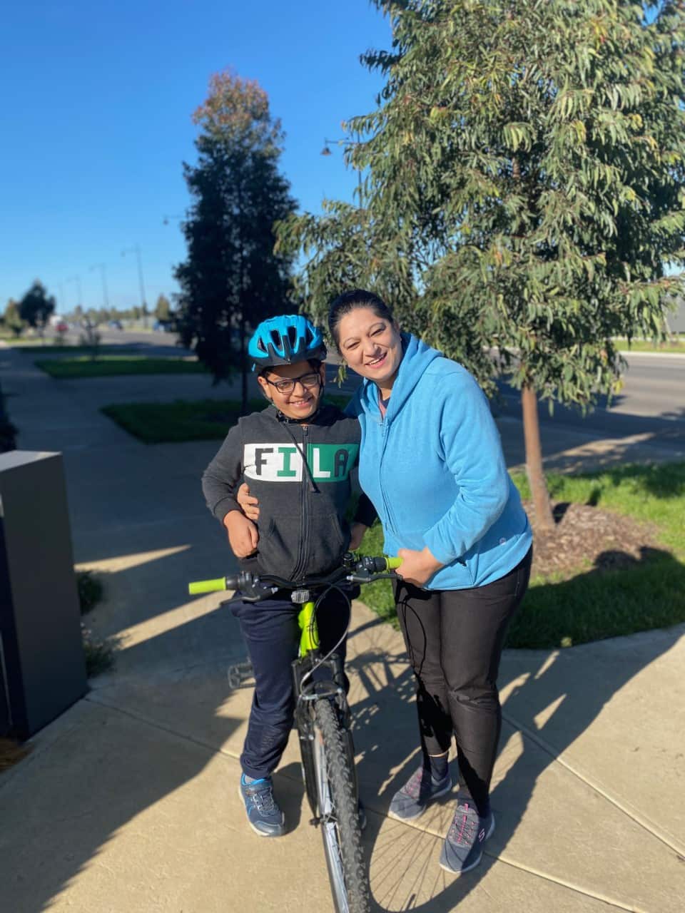 Prahalika Kalla enjoying a bike ride with her son