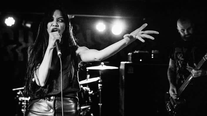 Karina Utomo is well known for her work with metal band High Tension. Alt