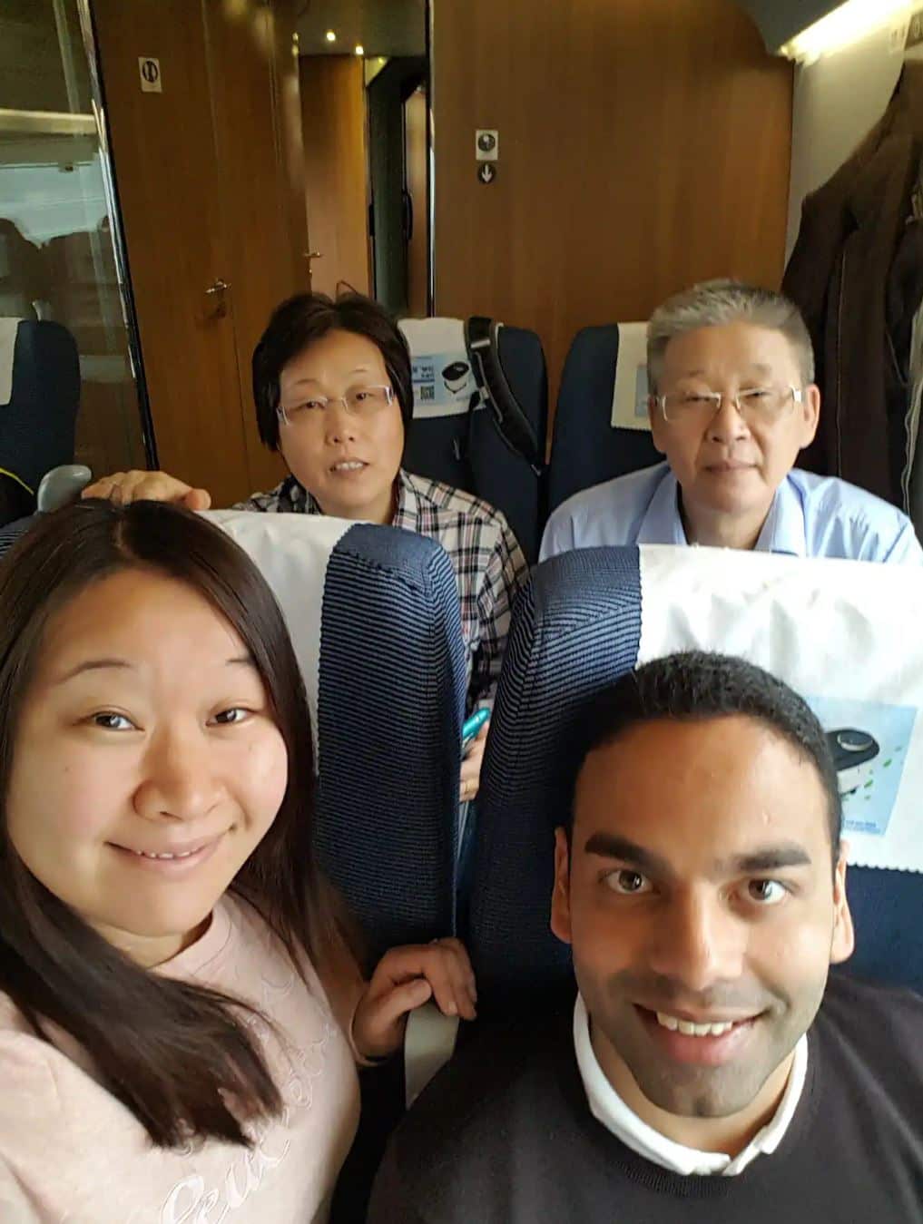 Lalith on a bus with his wife and his in-laws.